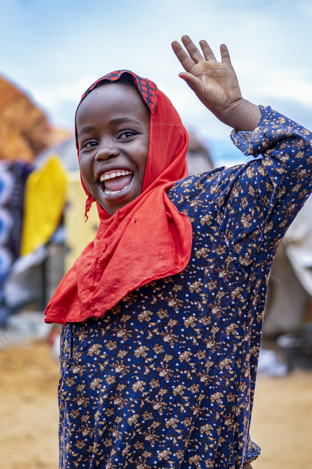 a person wearing a colorful head scarf