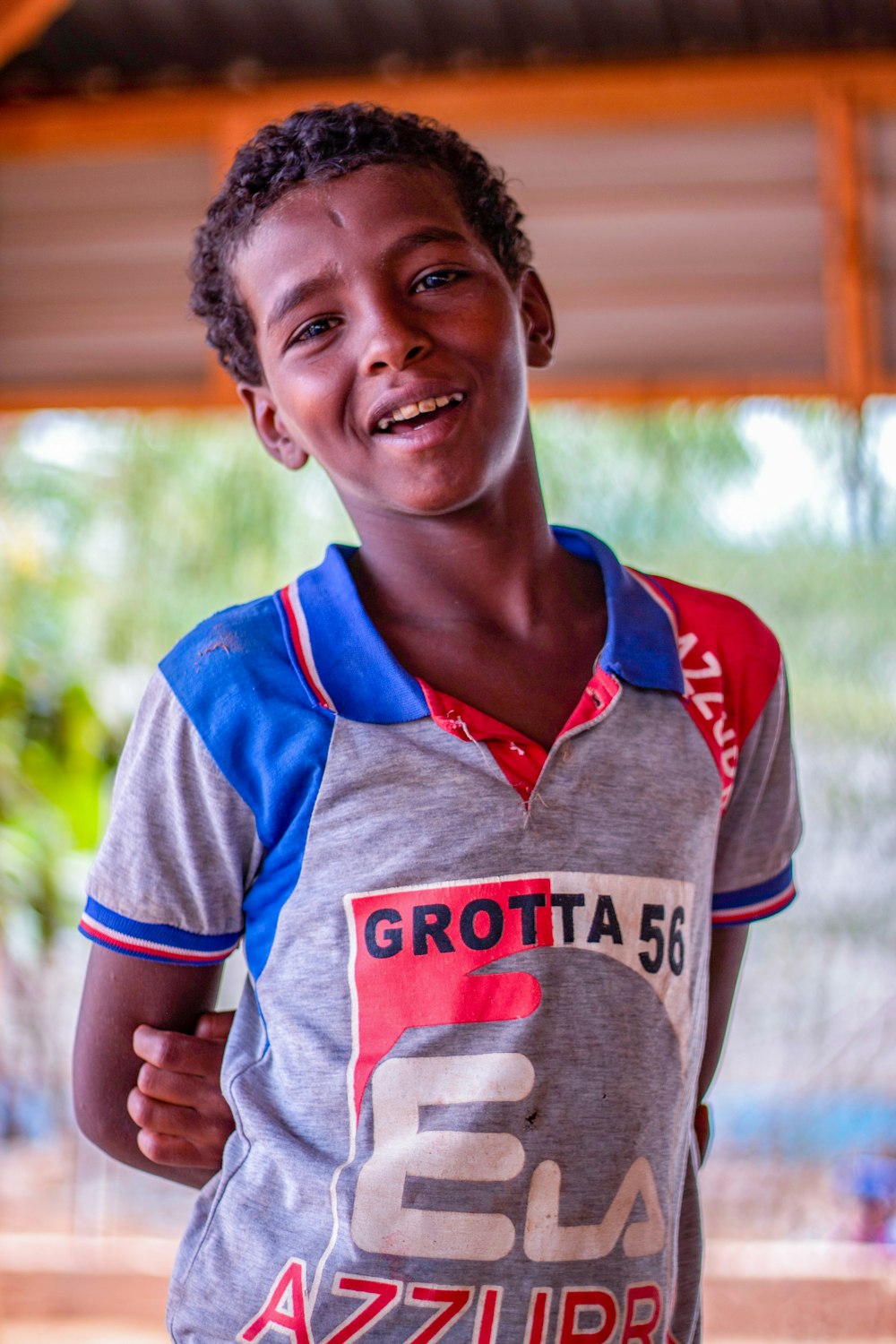 a boy in a sports uniform