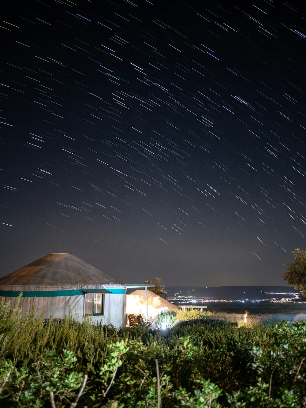 a house with a starry sky above it