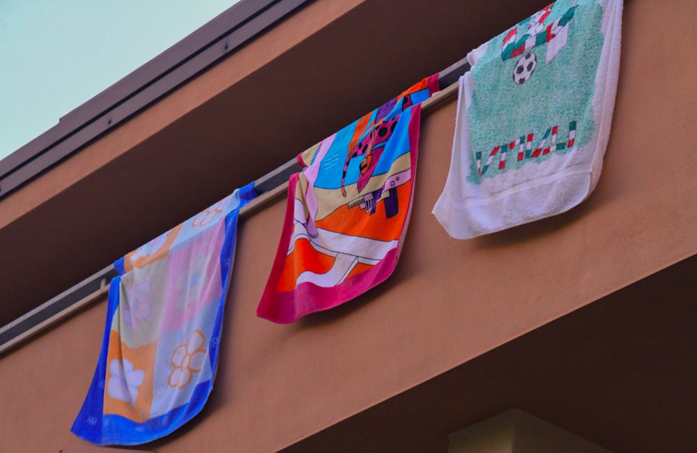 a group of folded shirts on a table