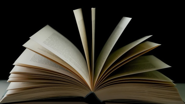 a stack of open books