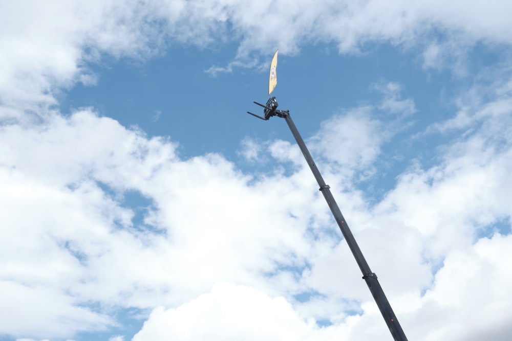 a wind turbine with a blue sky