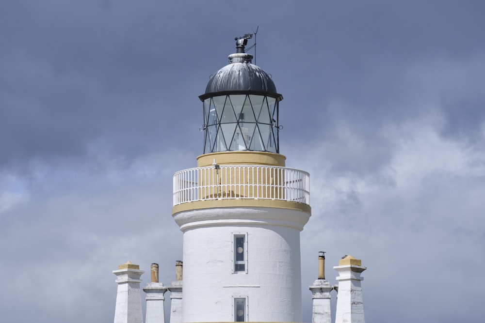 a white tower with a domed top