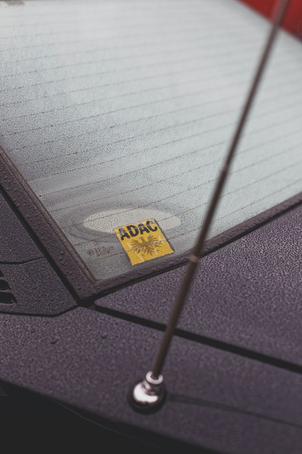 a black and yellow sign on a metal pole