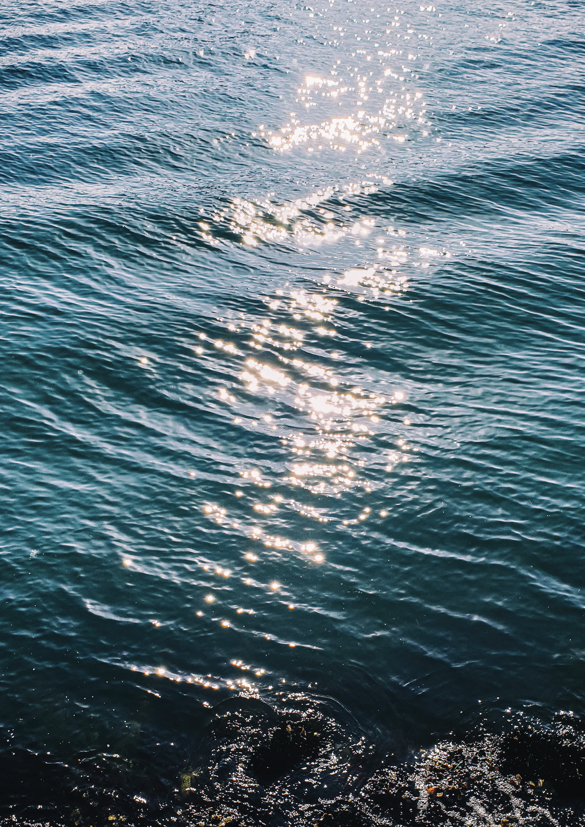 a body of water with waves