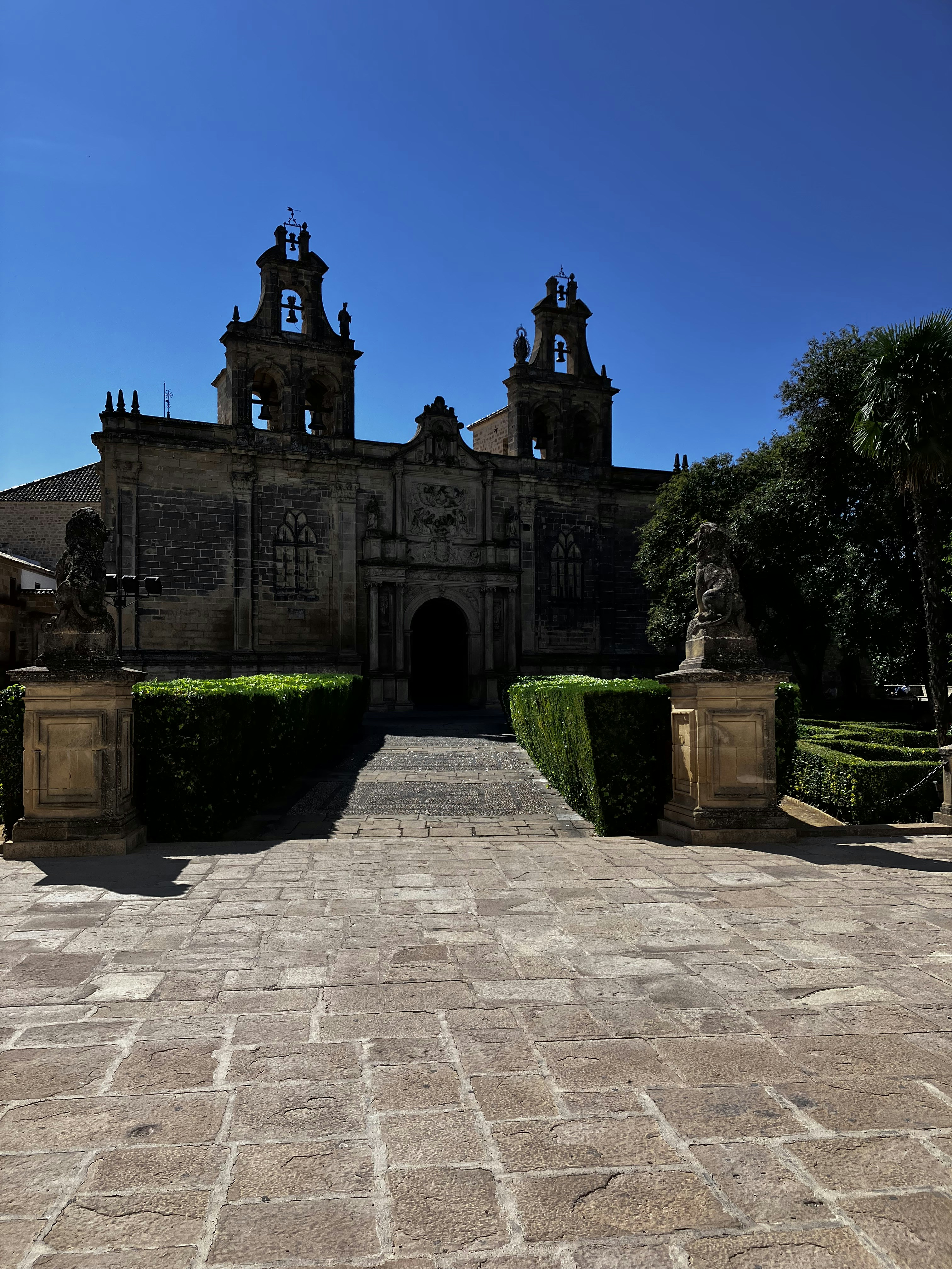 a stone building with a clock tower