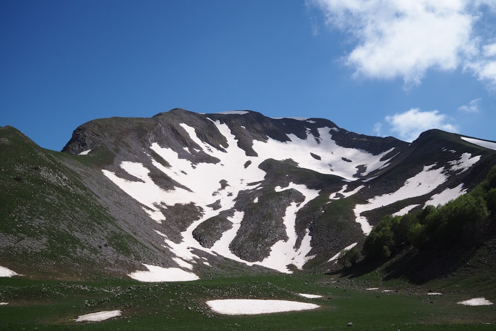 a mountain with snow