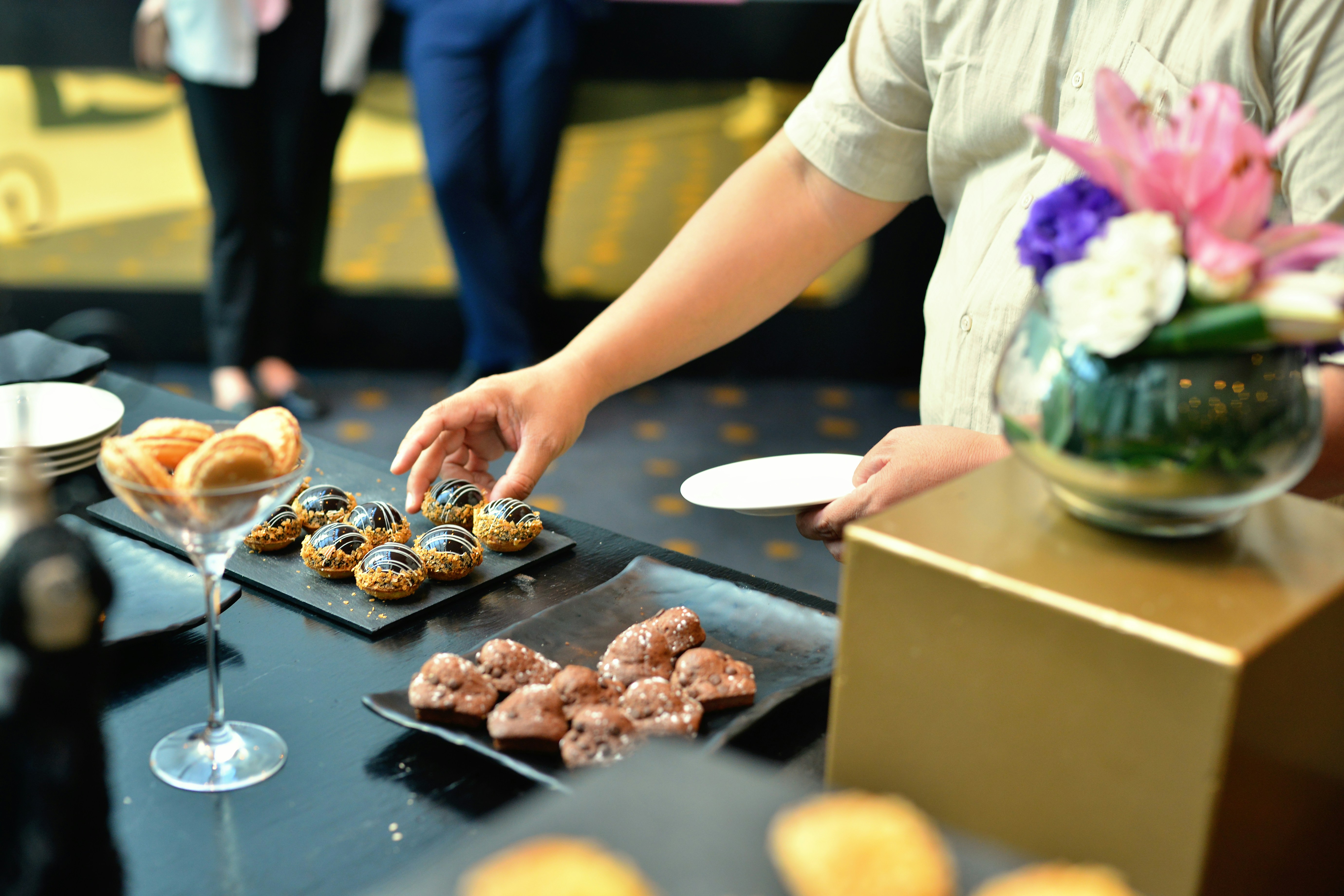 a person making donuts