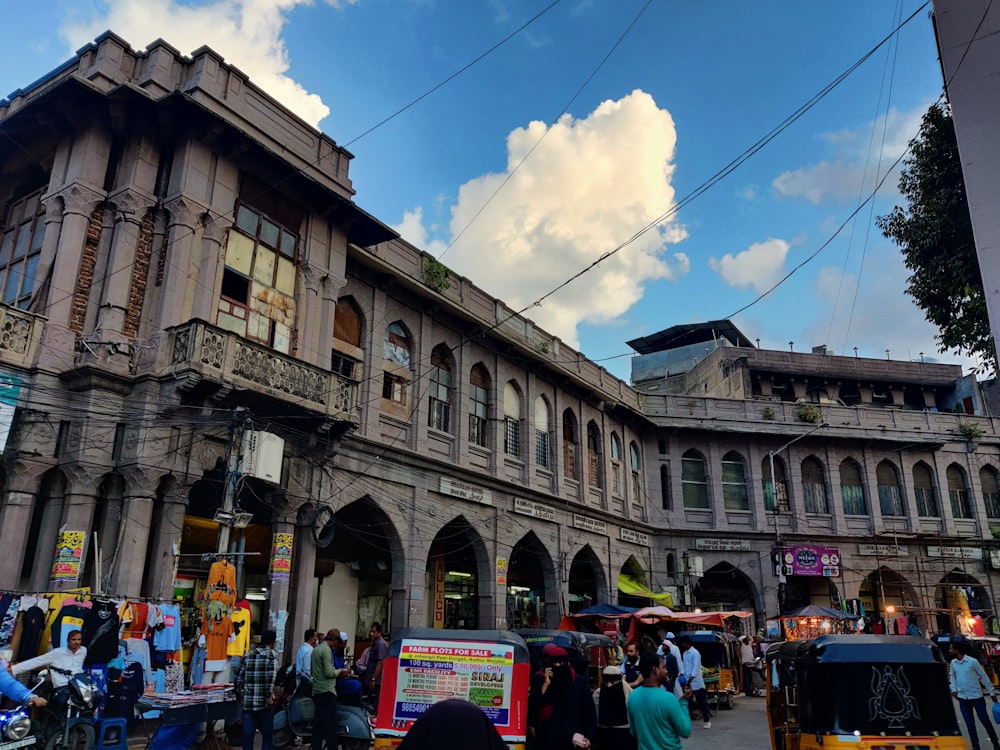 a street with buildings and people