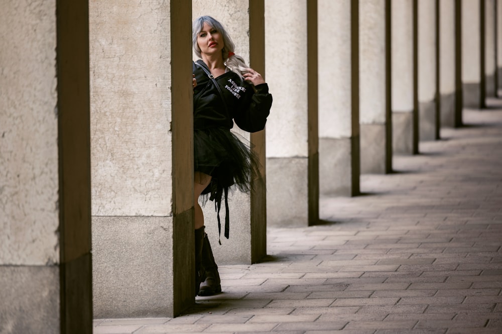 a woman in a black coat