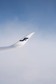 Close-up of sleek aviation merchandise displayed against a clear blue sky.