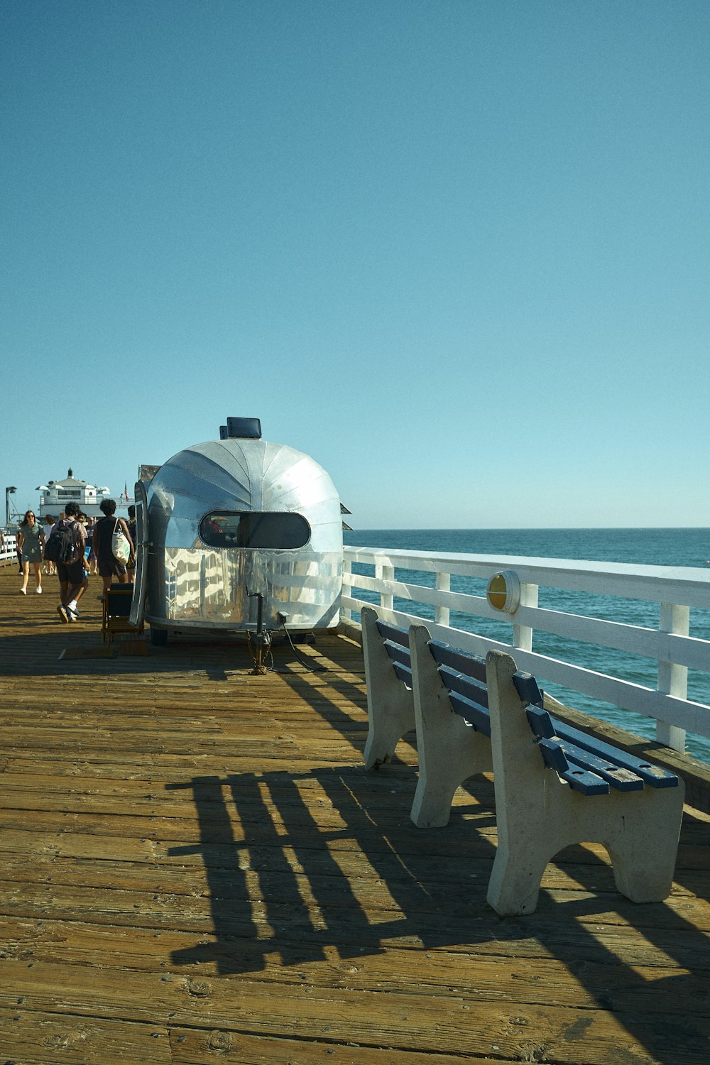 a white boat on a dock