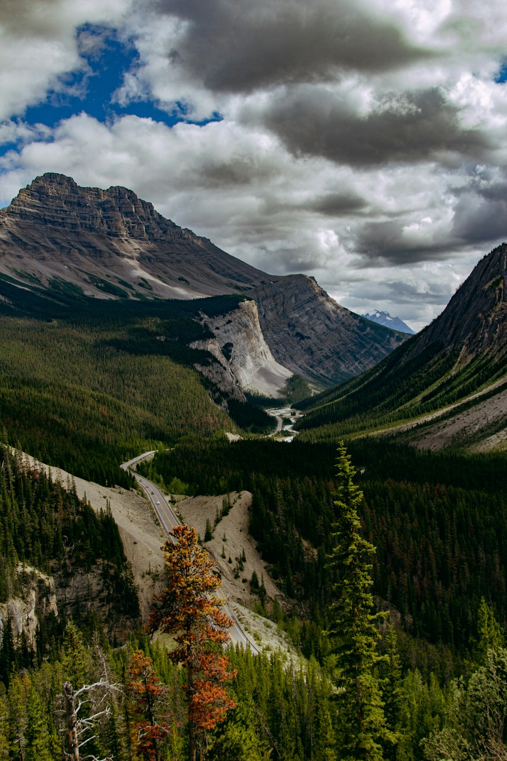 a winding road through a valley