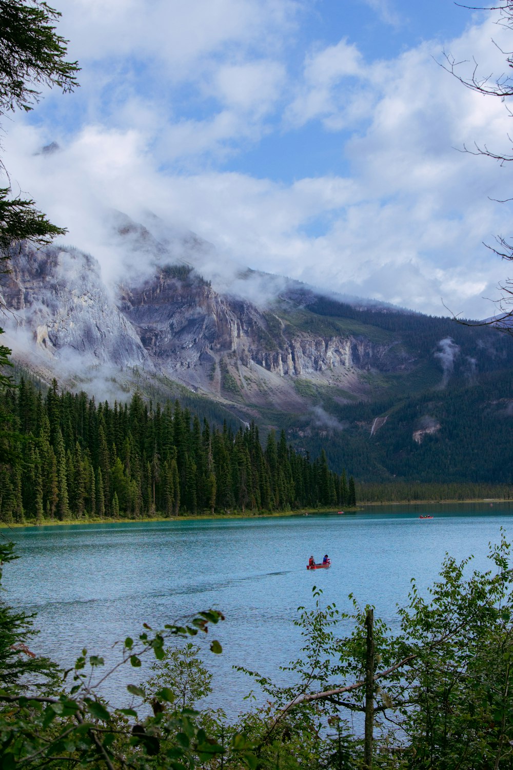 a lake with a mountain in the background