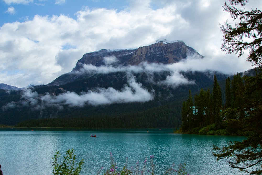 a lake with a mountain in the background