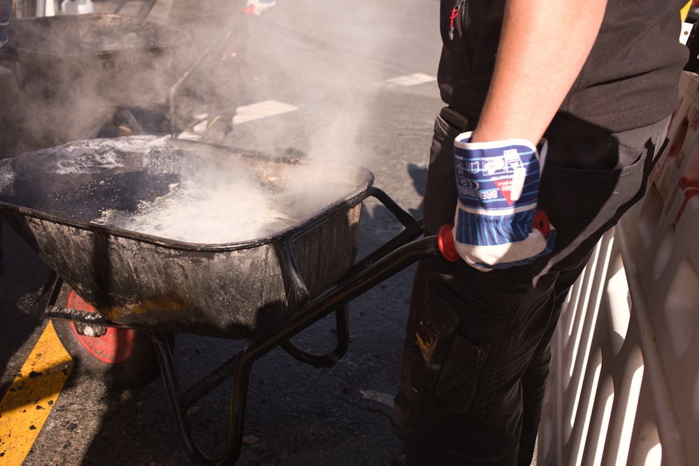 a person holding a can