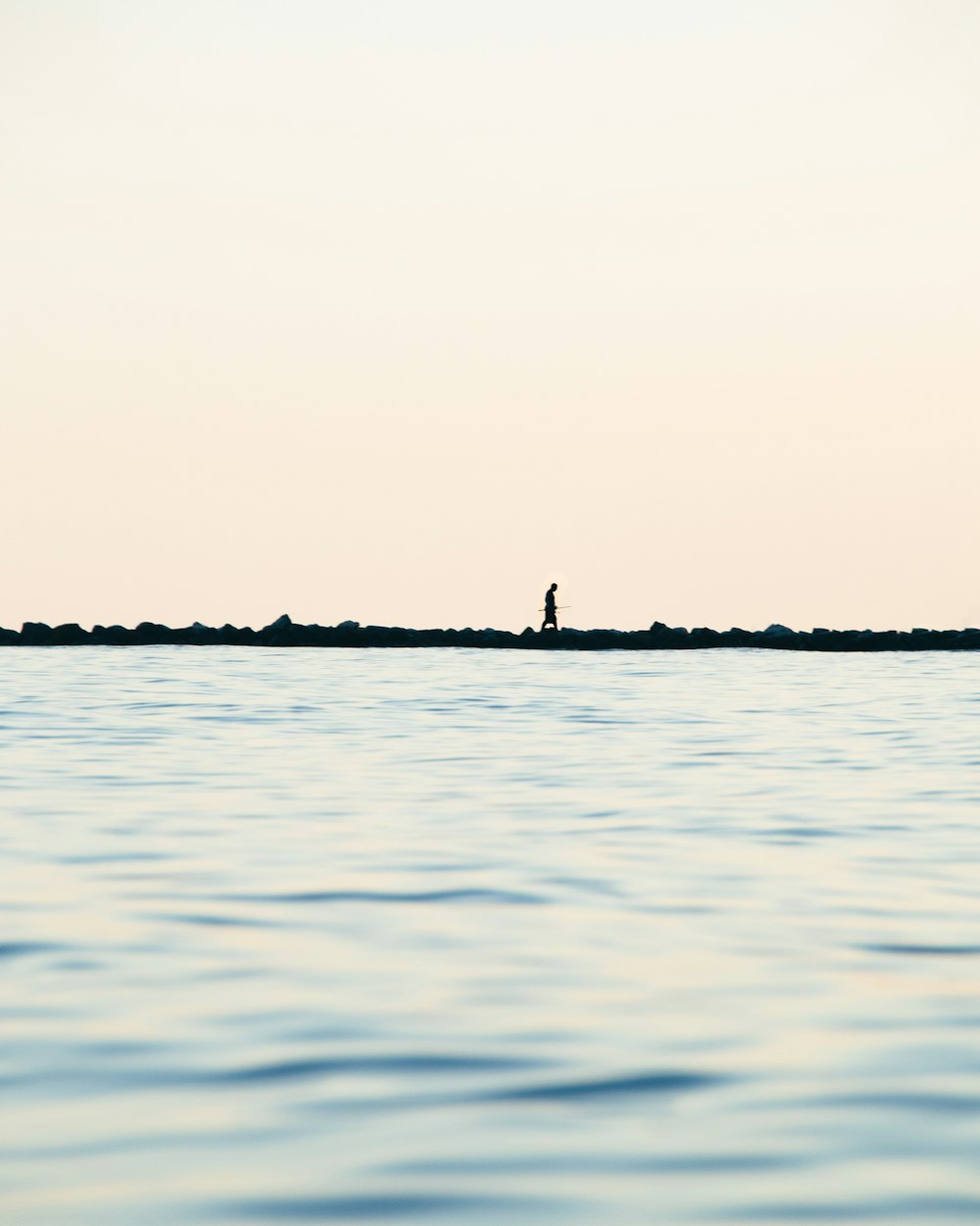 a person standing on a small island