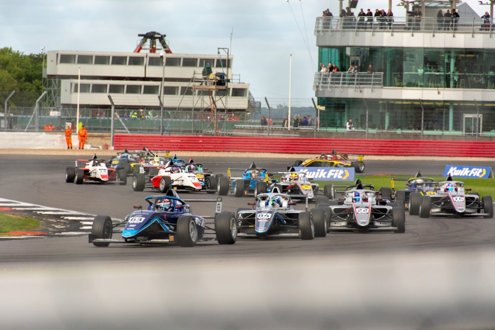 a group of race cars on a track