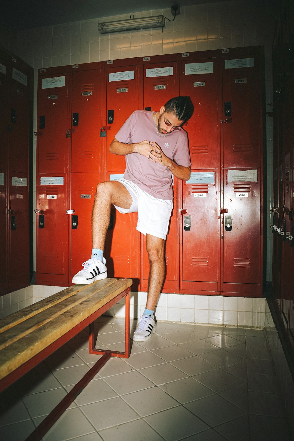 a man standing on a locker
