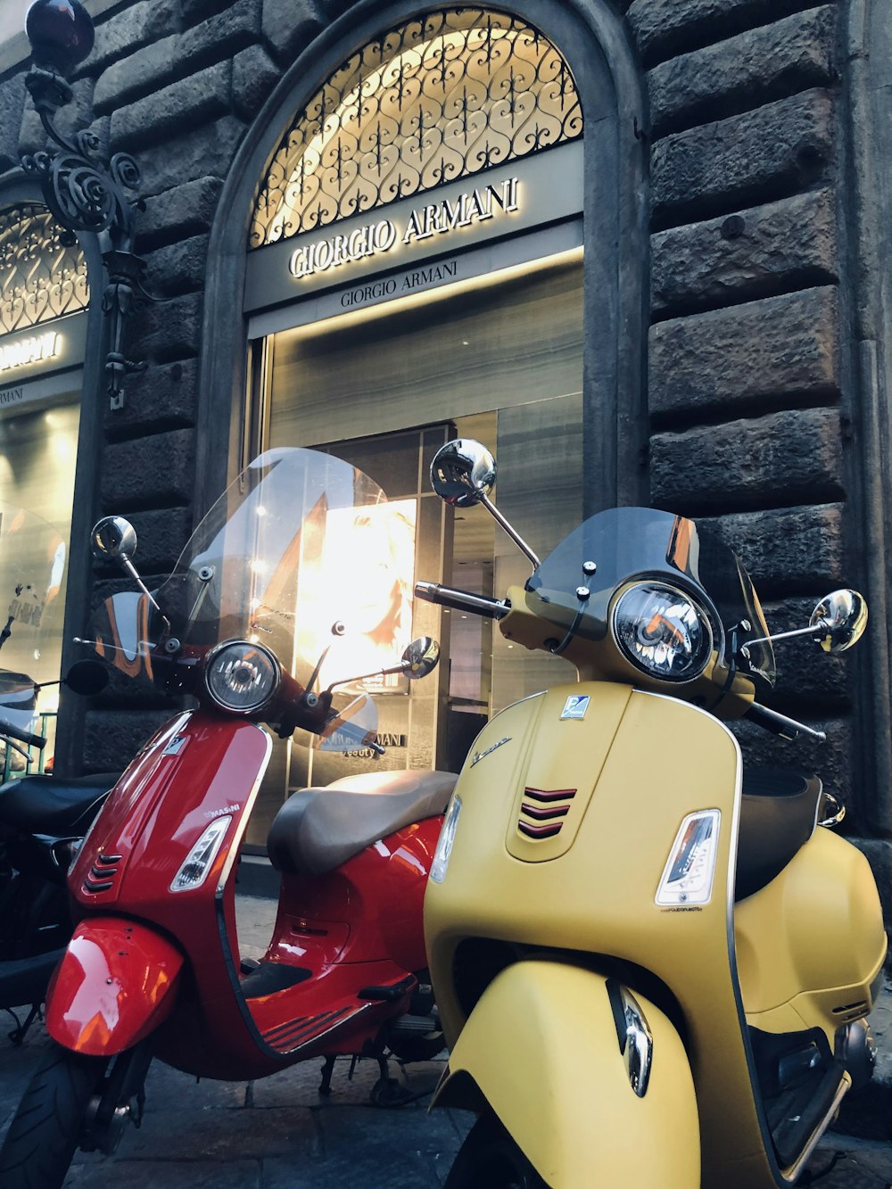 a red and yellow scooter