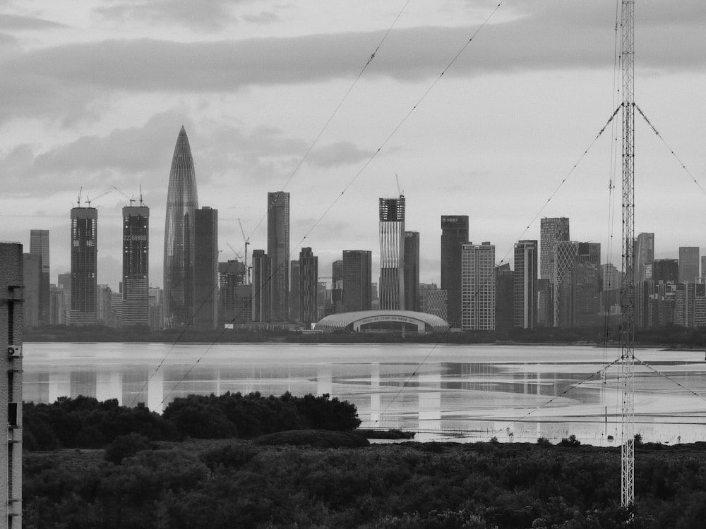 a city skyline with cranes