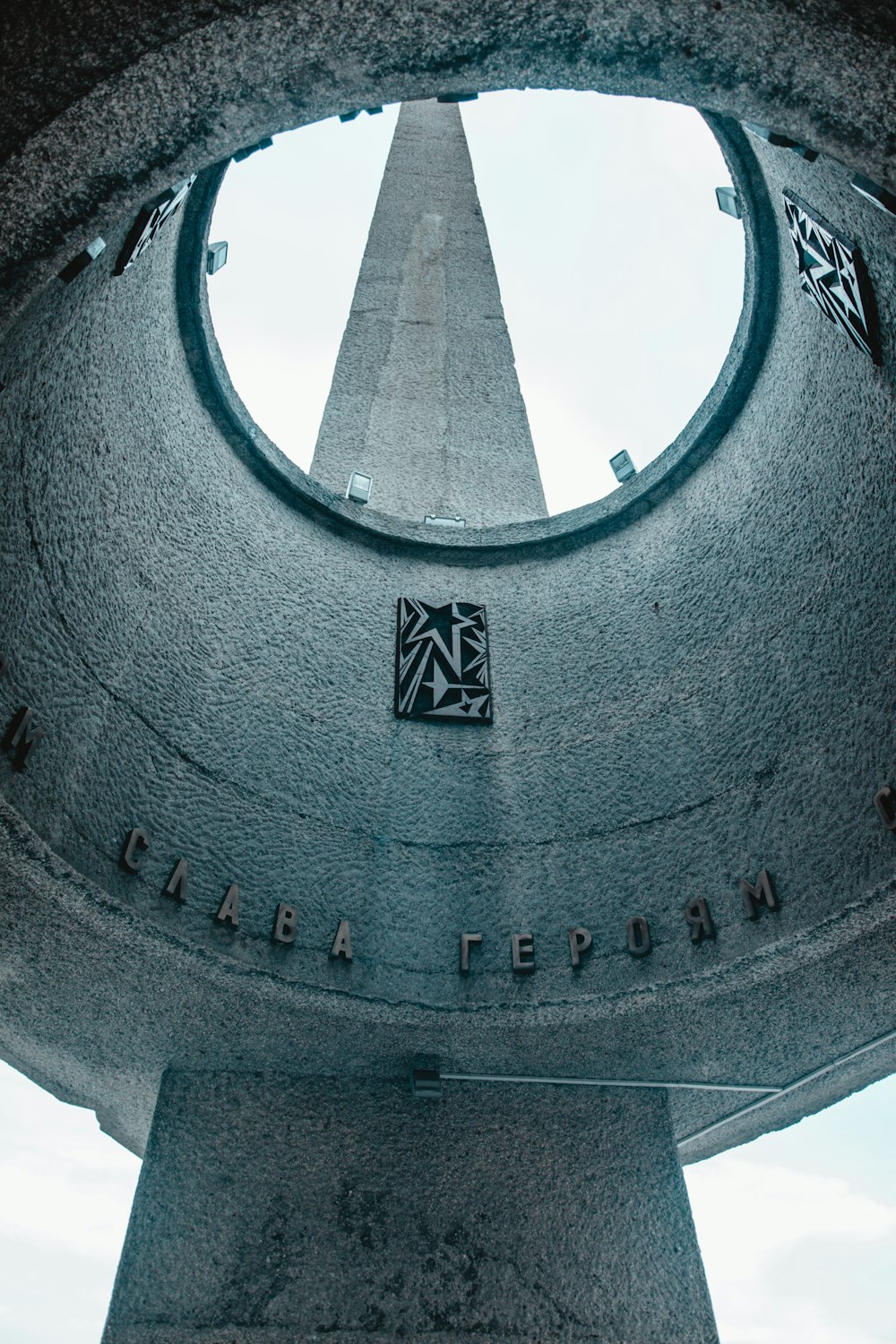 a cement block with a symbol on it