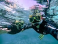a person in scuba gear under water