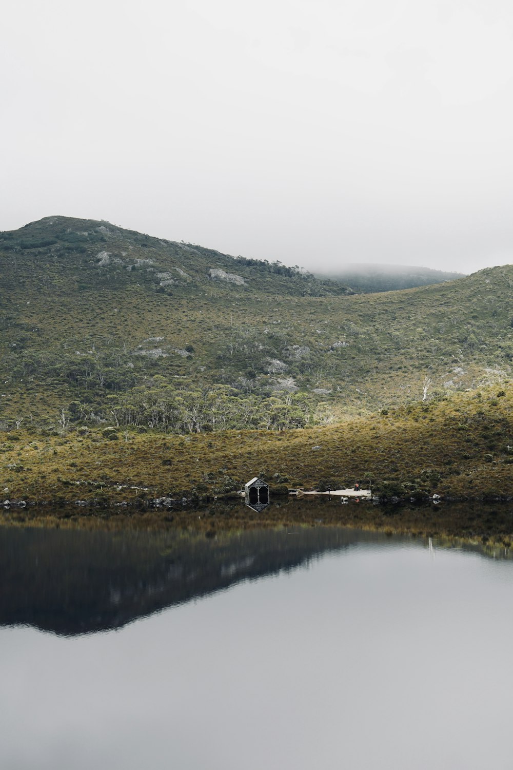 a lake with a mountain in the background