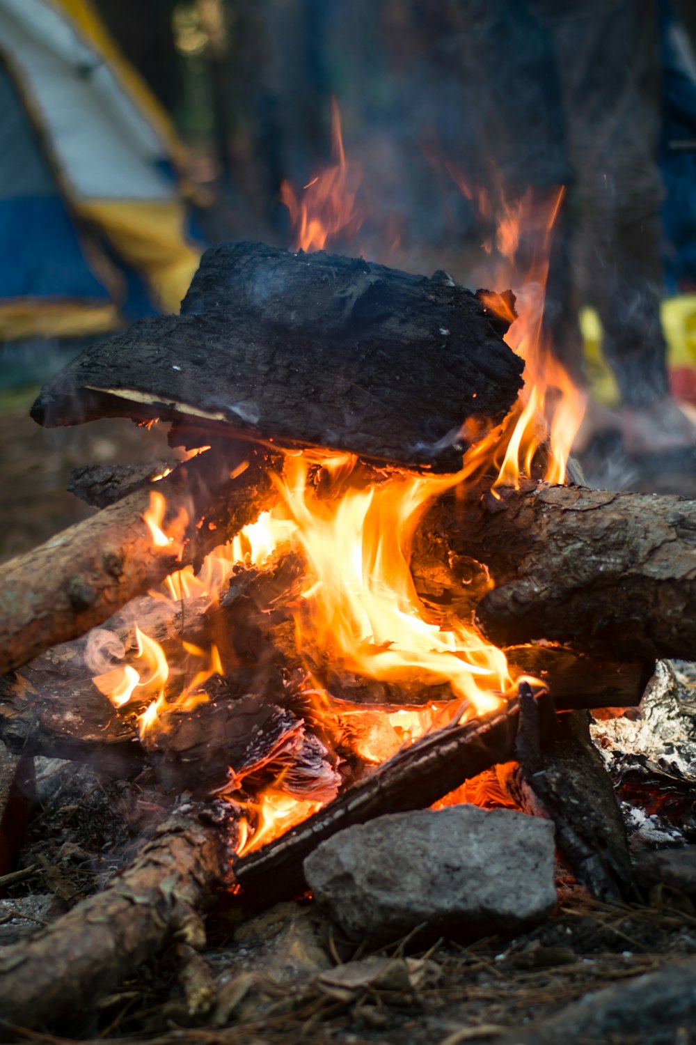 a fire burning in a pit