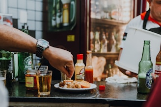 a person eating food at a restaurant