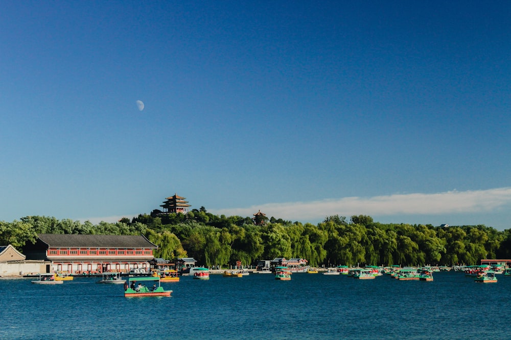 a body of water with boats and buildings along it