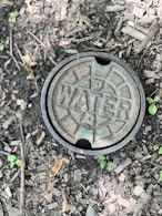 a round metal object on the ground