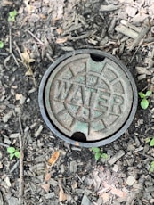 a round metal object on the ground