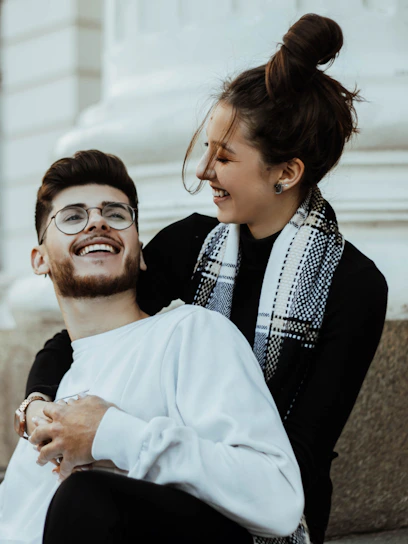 a woman kissing a man