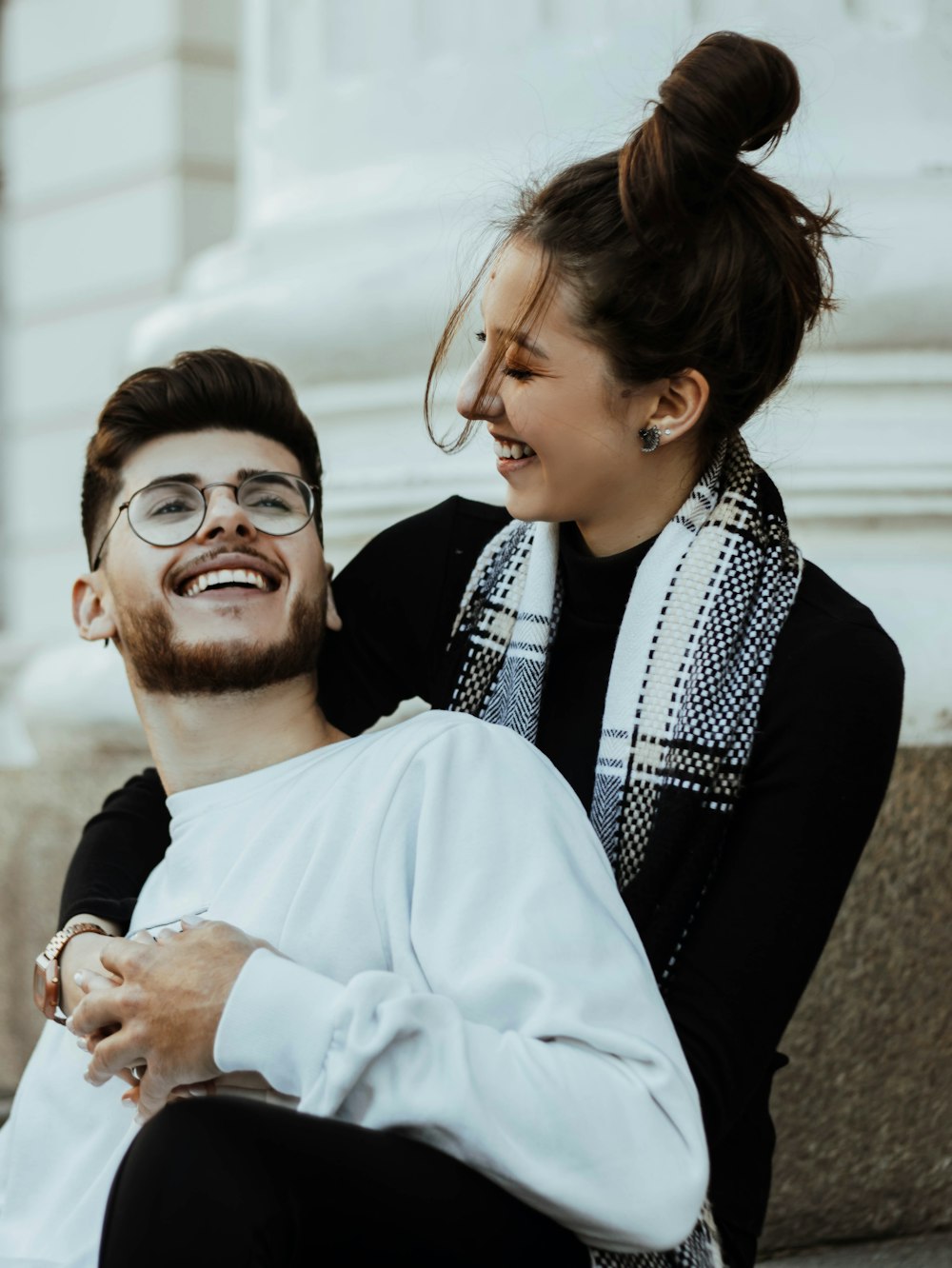 a woman kissing a man