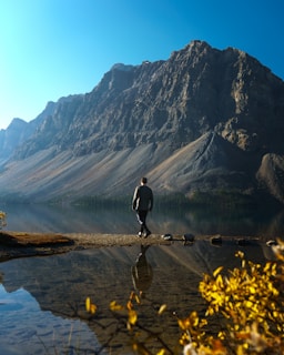 a man walking on a beach