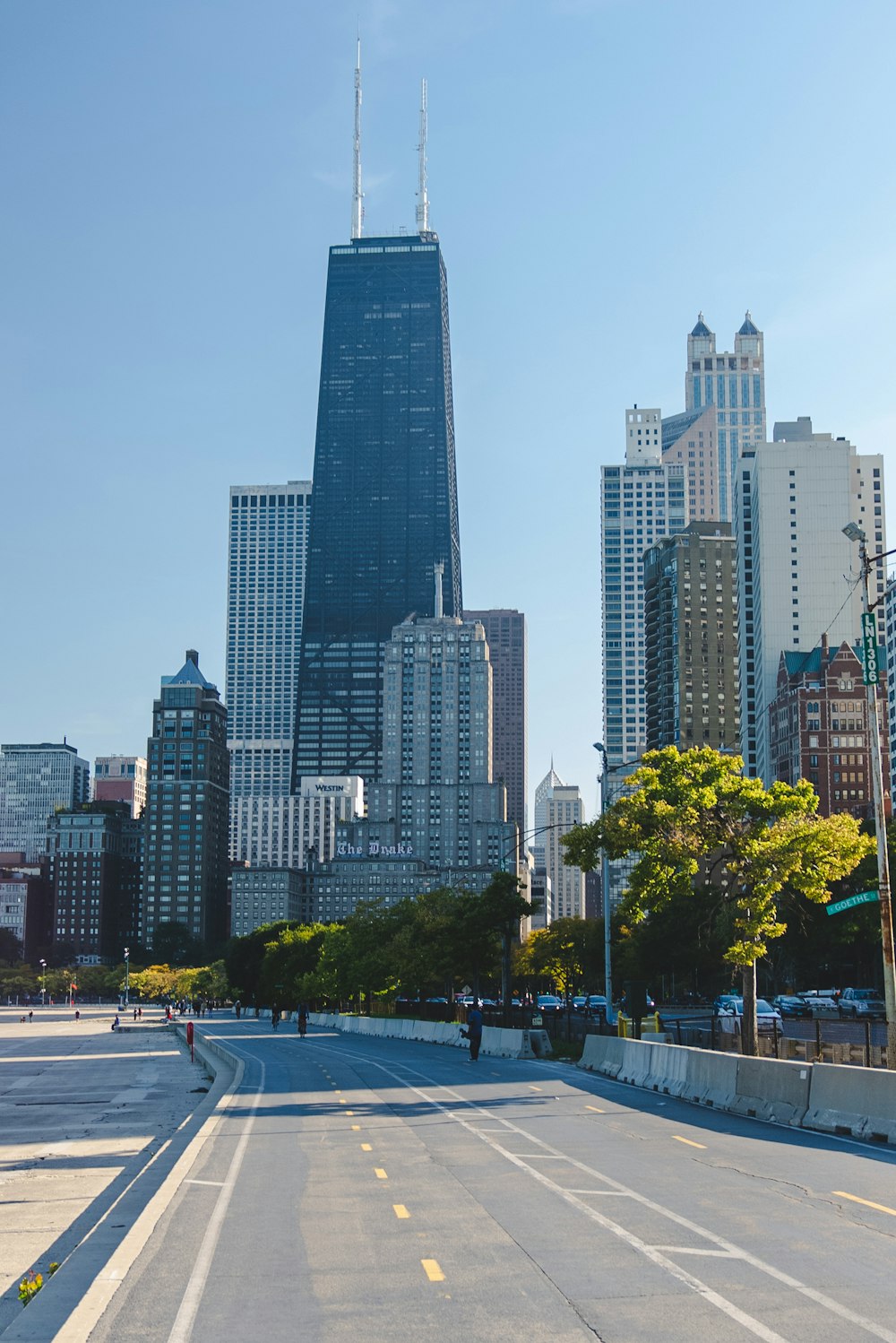 a city street with tall buildings