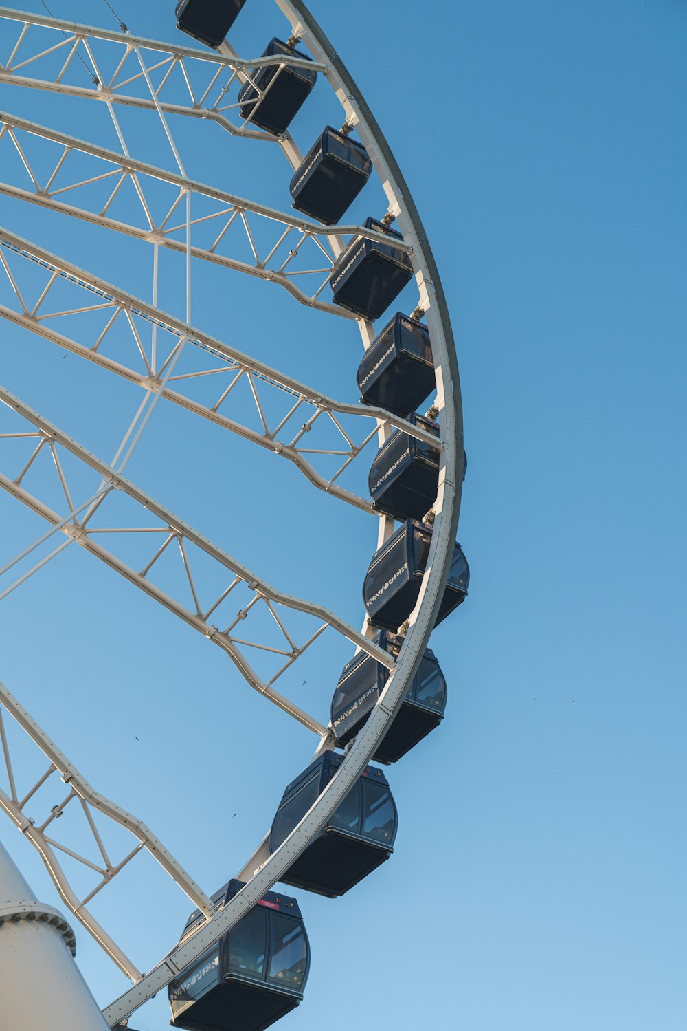 a ferris wheel with a blue sky