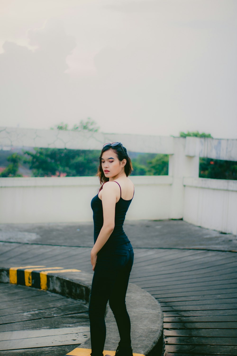 a woman standing on a deck