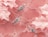 Three elegant rings featuring sparkling diamonds are artistically arranged against a delicate pink floral lace background. The diamonds catch the light, adding a touch of glamour and sophistication.