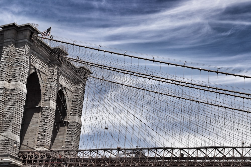 a large bridge with a glass wall