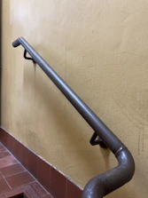 a black gun on a wall