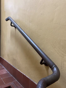 a black gun on a wall