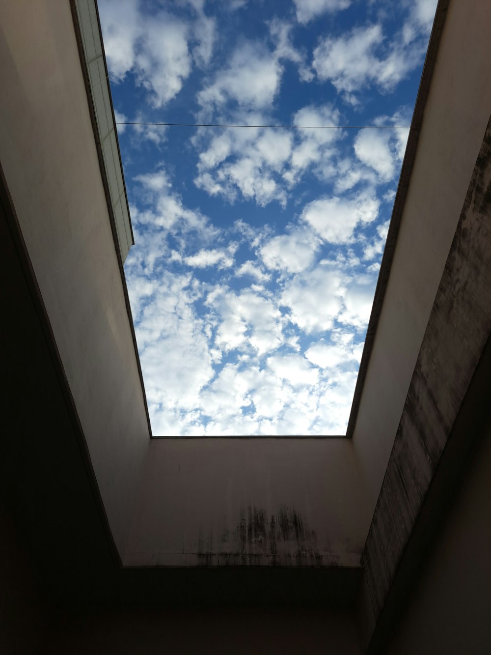 a view of the sky through a window