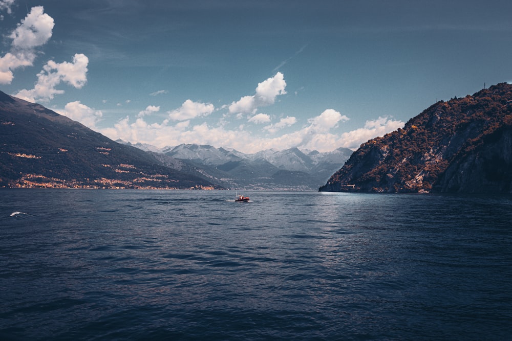 a body of water with mountains in the background with Chilliwack Lake in the background