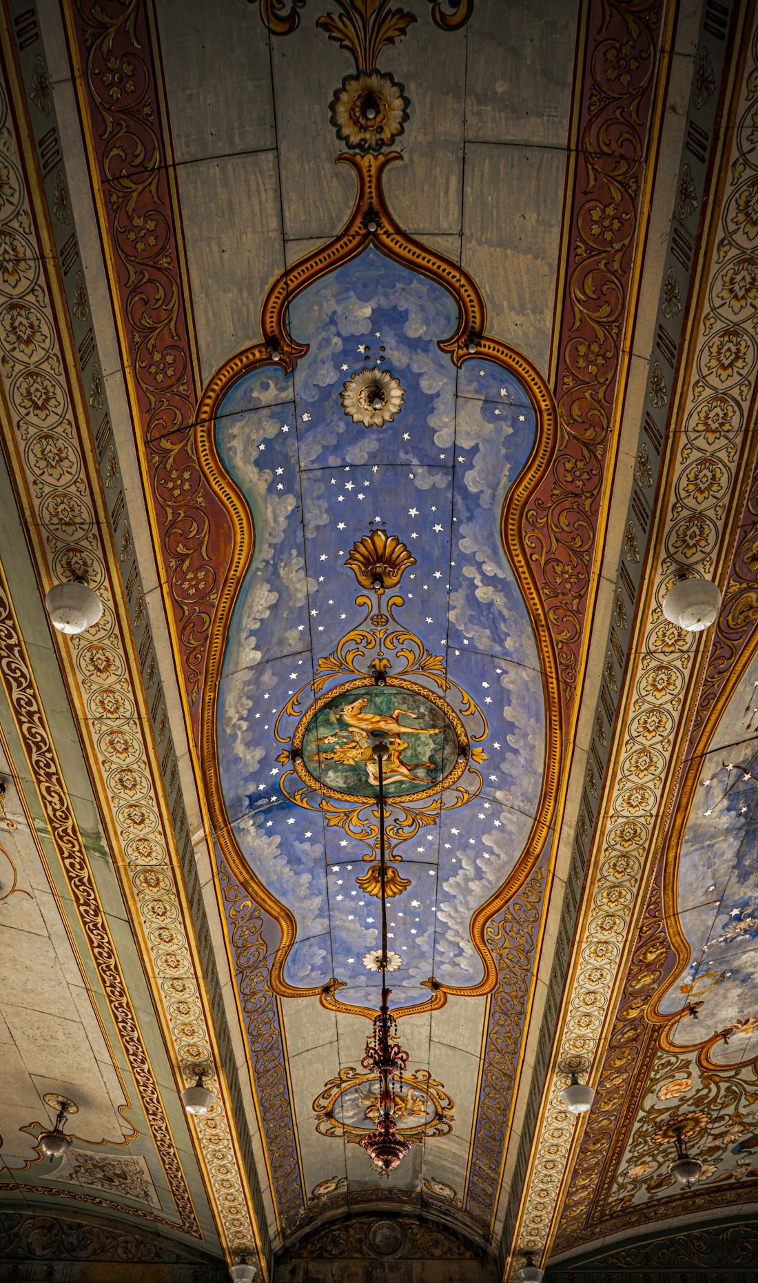 Ornate ceiling, arches and decorative columns inside Mysore Palace