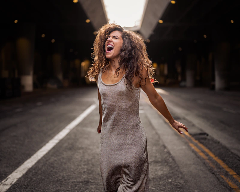 Laughing woman in a dress