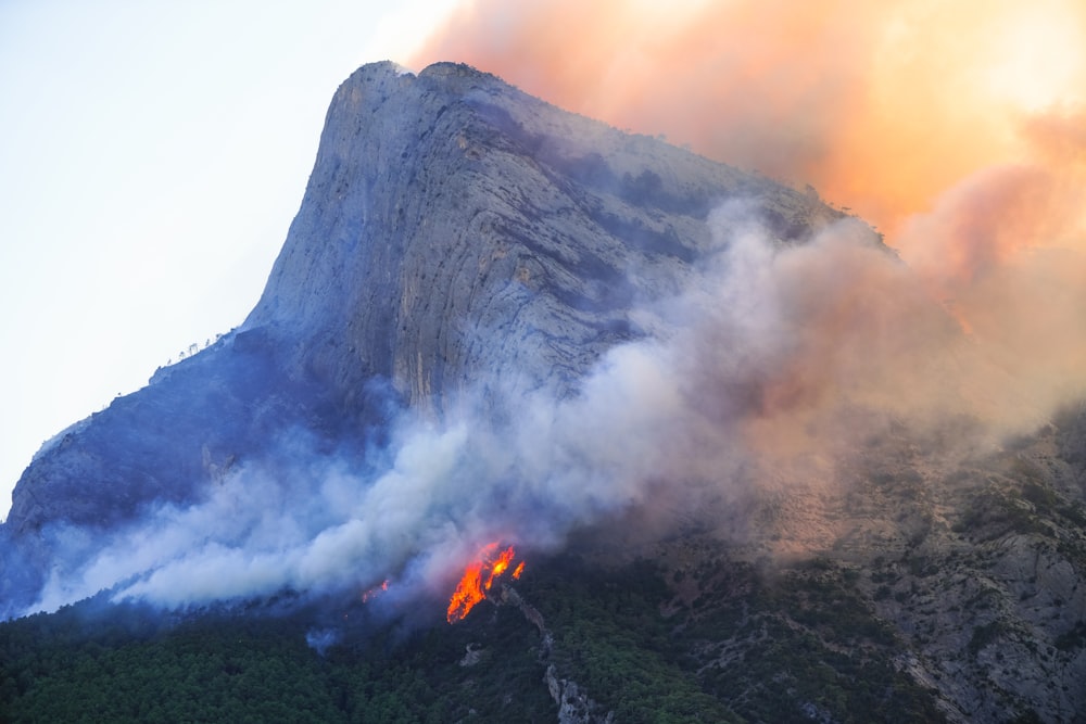 a volcano with lava coming out of it