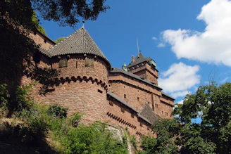 a large brick building with a tower