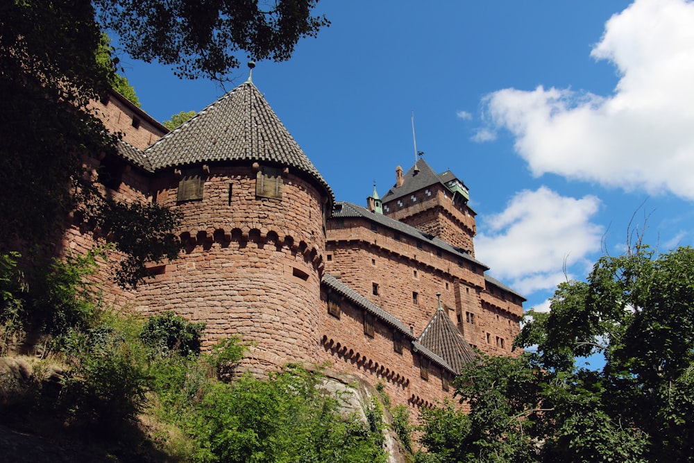 a large brick building with a tower